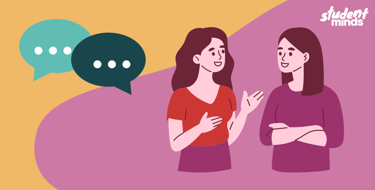 Two females stood talking