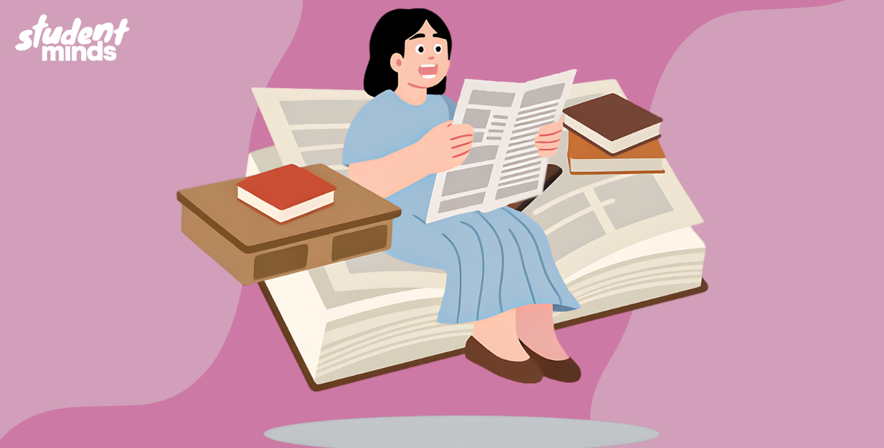 image of a woman sat on a book reading